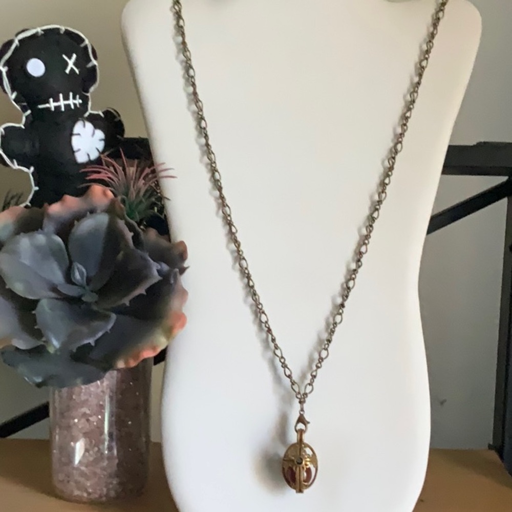 Jasper Stone in Brass Cross Cage And Emerald AB Gem on a Twisted Brass Chain